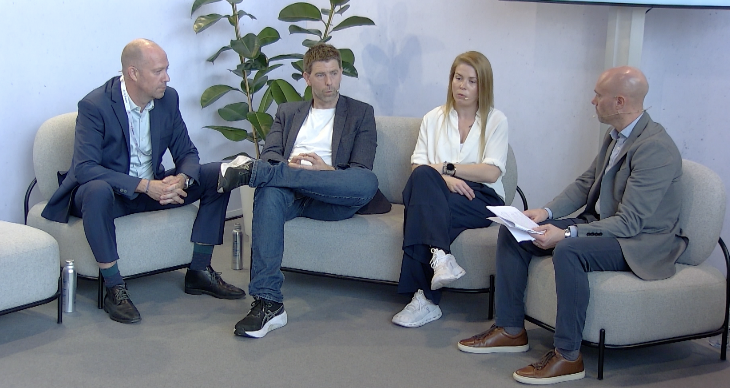 Image of people conversing during a panel interview